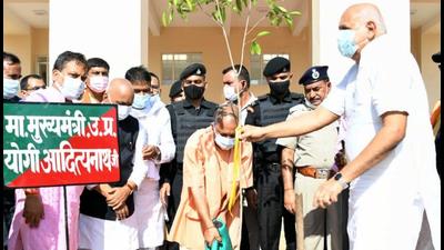 Uttar Pradesh chief minister Yogi Adityanath planting a sapling on the premises of a new medical college in Deoria. (SOURCED)
