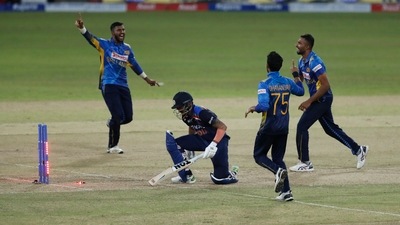 Sri Lankan team members Avishka Fernando, left, Dasun Shanaka, right, Dhananjaya de Silva celebrate the dismissal of India's Manish Pandey during the second one-day international cricket match. (AP) Sri Lankan team members Avishka Fernando, left, Dasun Shanaka, right, Dhananjaya de Silva celebrate the dismissal of India's Manish Pandey during the second one-day international cricket match. (AP)