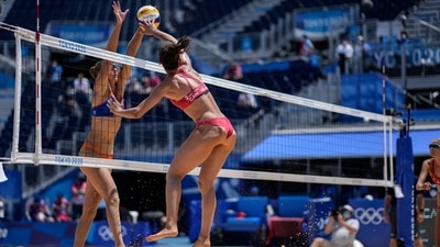 Katja Stam, of the Netherlands, blocks against Melissa Humana-Paredes, of Canada, during a women's beach volleyball match at the 2020 Summer Olympics, Saturday, July 24, 2021, in Tokyo, Japan. (AP Photo/Petros Giannakouris) (AP) Katja Stam, of the Netherlands, blocks against Melissa Humana-Paredes, of Canada, during a women's beach volleyball match at the 2020 Summer Olympics, Saturday, July 24, 2021, in Tokyo, Japan. (AP Photo/Petros Giannakouris) (AP)