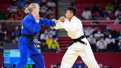 Shushila Devi Likmabam of India, right, and Eva Csernoviczki of Hungary compete during their women's -48kg round of 32 judo match at the 2020 Summer Olympics, Saturday, July 24, 2021, in Tokyo, Japan. (AP Photo/Vincent Thian) (AP) Shushila Devi Likmabam of India, right, and Eva Csernoviczki of Hungary compete during their women's -48kg round of 32 judo match at the 2020 Summer Olympics, Saturday, July 24, 2021, in Tokyo, Japan. (AP Photo/Vincent Thian) (AP)