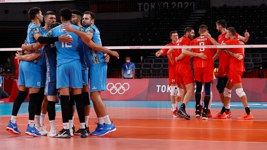 Tokyo 2020 Olympics - Volleyball - Men's Pool B - The Russian Olympic Committee v Argentina - Ariake Arena, Tokyo, Japan - July 24, 2021. Players huddle before the match. REUTERS/Valentyn Ogirenko(REUTERS)