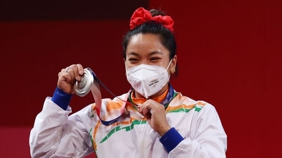 Tokyo 2020 Olympics - Weightlifting - Women's 49kg - Medal Ceremony - Tokyo International Forum, Tokyo, Japan - July 24, 2021. Silver medalist Mirabai Chanu Saikhom of India reacts. REUTERS/Edgard Garrido(REUTERS)