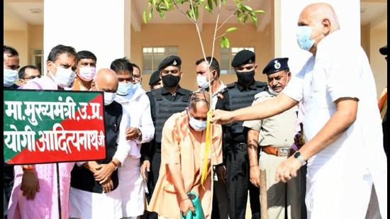 Uttar Pradesh chief minister Yogi Adityanath planting a sapling on the premises of a new medical college in Deoria. (SOURCED)