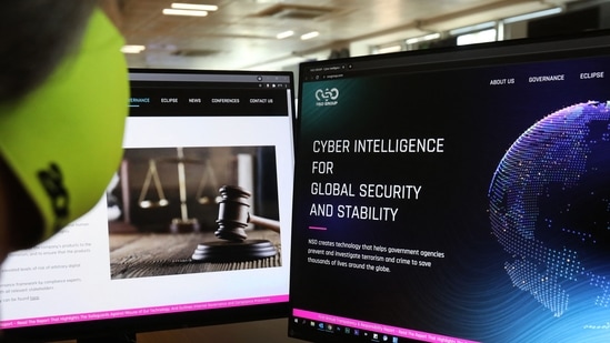 A woman checks the website of Israel-made Pegasus spyware at an office in the Cypriot capital Nicosia on July 21, 2021. (AFP) A woman checks the website of Israel-made Pegasus spyware at an office in the Cypriot capital Nicosia on July 21, 2021. (AFP)