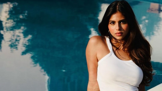 Suhana Khan poses by the pool.