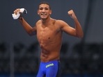  Ahmed Hafnaoui of Tunisia celebrates after winning.