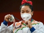 Tokyo 2020: Here's why Domino's offered free pizza for life to silver medallist Mirabai Chanu (in frame). Tokyo 2020: Here's why Domino's offered free pizza for life to silver medallist Mirabai Chanu (in frame).