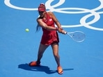 Naomi Osaka, of Japan, returns to China's Zheng Saisai during the tennis competition at the 2020 Summer Olympics.(AP) Naomi Osaka, of Japan, returns to China's Zheng Saisai during the tennis competition at the 2020 Summer Olympics.(AP)