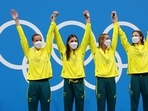Australian women's 4x100m freestyle relay team celebrate after winning the gold medal at the 2020 Summer Olympics