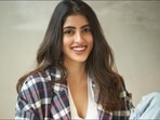 Navya Naveli Nanda steals limelight with semi-formals in plaid blazer over white cardigan, denim jeans