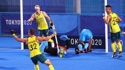 Tokyo 2020 Olympics - Hockey - Men's Pool A - India v Australia - Oi Hockey Stadium, Tokyo, Japan - July 25, 2021.  Players of Australia celebrate their goal. REUTERS/Bernadett Szabo (REUTERS)