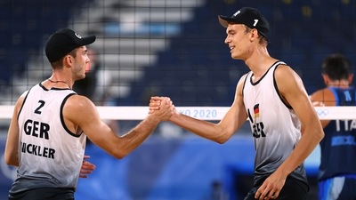 Tokyo 2020 Olympics - Beach Volleyball - Men - Pool F - Germany (Thole J/Wickler) v Italy (Nicolai/Lupo) - Shiokaze Park, Tokyo, Japan - July 25, 2021. Julius Thole of Germany and Clemens Wickler of Germany during the match. REUTERS/Pilar Olivares (REUTERS)