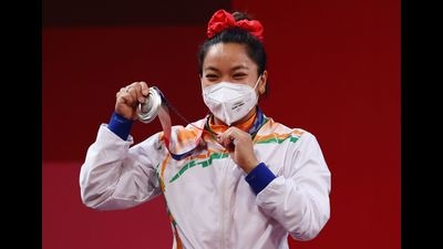 Chanu, who comes from a farming village near Imphal, has been one of the world’s best weightlifters in her category, 49kg, for some time now. She has won a world championship and holds the world record in one of the Olympics lifts, the clean & jerk. The Olympic silver simply adds to the aura and signals, yet again, the pioneering path forged by athletes from Manipur. (REUTERS) Chanu, who comes from a farming village near Imphal, has been one of the world’s best weightlifters in her category, 49kg, for some time now. She has won a world championship and holds the world record in one of the Olympics lifts, the clean & jerk. The Olympic silver simply adds to the aura and signals, yet again, the pioneering path forged by athletes from Manipur. (REUTERS)