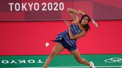 India's Pusarla V. Sindhu competes against Israel's Ksenia Polikarpova during their women's singles badminton match at the 2020 Summer Olympics. (AP) India's Pusarla V. Sindhu competes against Israel's Ksenia Polikarpova during their women's singles badminton match at the 2020 Summer Olympics. (AP)