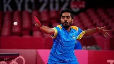 Sathiyan Gnanasekaran of India competes during the table tennis men's singles second round match against Lam Siu Hang of Hong Kong at the 2020 Summer Olympics, Sunday, July 25, 2021, in Tokyo. (AP Photo/Kin Cheung) (AP) Sathiyan Gnanasekaran of India competes during the table tennis men's singles second round match against Lam Siu Hang of Hong Kong at the 2020 Summer Olympics, Sunday, July 25, 2021, in Tokyo. (AP Photo/Kin Cheung) (AP)