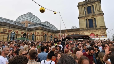 Amid the crucial Covid-19 situation in the United Kingdon, people celebrate one-day Kaleidoscope festival. (AFP) Amid the crucial Covid-19 situation in the United Kingdon, people celebrate one-day Kaleidoscope festival. (AFP)