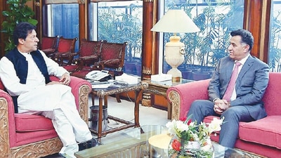 Pakistan Prime Minister Imran Khan is seen with ISI chief Faiz Hameed in this file photo. (Dawn Photo) Pakistan Prime Minister Imran Khan is seen with ISI chief Faiz Hameed in this file photo. (Dawn Photo)
