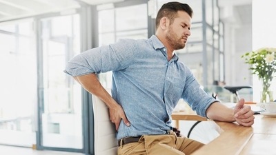 Doctors say the lack of physical activity, bad nutrition, and incorrect postures for the chronic back issues (Getty Images)