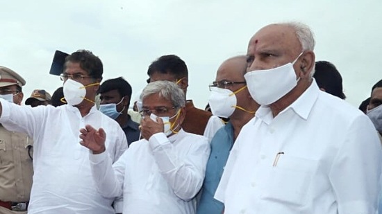 Karnataka Chief Minister BS Yediyurappa inspects the flood-affected areas during his visit, in Belagavi on Sunday. (ANI Photo)