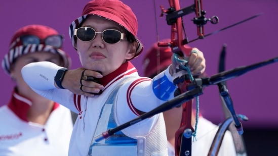 Svetlana Gomboleva of the Russian Olympic Committee releases an arrow during the women's team competition at the 2020 Summer Olympics, Sunday, July 25, 2021, in Tokyo, Japan. (AP Photo/Alessandra Tarantino)(AP)