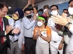 Olympic silver medallist Mirabai Chanu arrives at the airport from Tokyo, in New Delhi on Monday.