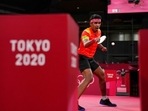 India's Kamal Achanta competes during the table tennis men's singles second-round match against Portugal's Tiago Apolonia at the 2020 Summer Olympics.