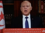 In this photo taken from the presidential television station, Tunisian president Kais Saied announces the dissolution of parliament and Prime Minister Mechichi's government on July 25, 2021, at Carthage Palace after a day of nationwide protest. 