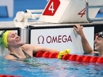 Australia’s Ariarne Titmus (L) and Katie Ledecky (R) of the US