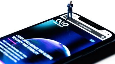A smartphone with the website of Israel's NSO Group which makes the Pegasus spyware. (AF) A smartphone with the website of Israel's NSO Group which makes the Pegasus spyware. (AF)