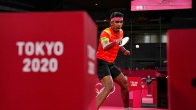India's Kamal Achanta competes during the table tennis men's singles second-round match against Portugal's Tiago Apolonia at the 2020 Summer Olympics. (AP)