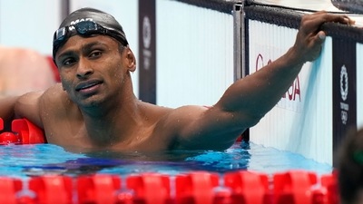Sajan Prakash of India rests after his heat in the men's 200-meter butterfly at the 2020 Summer Olympics, Monday, July 26, 2021, in Tokyo, Japan. (AP)