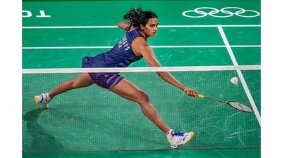 India's Pusarla V Sindhu competes against Israel’s Ksenia Polikarpova during their women's singles badminton match, in Tokyo on July 25. Sindhu beat Polikarpova with scores of 27-7, 21-10. India's Pusarla V Sindhu competes against Israel’s Ksenia Polikarpova during their women's singles badminton match, in Tokyo on July 25. Sindhu beat Polikarpova with scores of 27-7, 21-10.