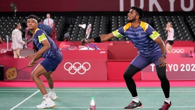 India's Satwiksairaj and Chirag Shetty play against Indonesia's Marcus Gideon and Kevin Zanjaya Sukamuljo during their men's doubles group play stage badminton match at the 2020 Summer Olympics, Monday, July 26, 2021, in Tokyo, Japan. (AP Photo/Dita Alangkara) (AP) India's Satwiksairaj and Chirag Shetty play against Indonesia's Marcus Gideon and Kevin Zanjaya Sukamuljo during their men's doubles group play stage badminton match at the 2020 Summer Olympics, Monday, July 26, 2021, in Tokyo, Japan. (AP Photo/Dita Alangkara) (AP)