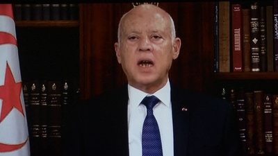 In this photo taken from the presidential television station, Tunisian president Kais Saied announces the dissolution of parliament and Prime Minister Mechichi's government on July 25, 2021, at Carthage Palace after a day of nationwide protest. (Fethi Belaid / AFP) In this photo taken from the presidential television station, Tunisian president Kais Saied announces the dissolution of parliament and Prime Minister Mechichi's government on July 25, 2021, at Carthage Palace after a day of nationwide protest. (Fethi Belaid / AFP)