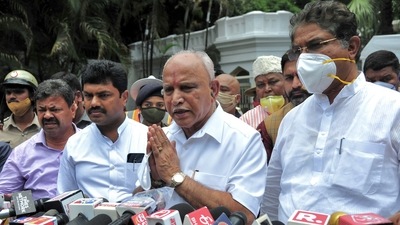 BS Yediyurappa (C) gestures as he speaks to the medias outside the Governor's official residence Raj Bhavan after tendering resignation to his post in Bengaluru. (AFP) BS Yediyurappa (C) gestures as he speaks to the medias outside the Governor's official residence Raj Bhavan after tendering resignation to his post in Bengaluru. (AFP)