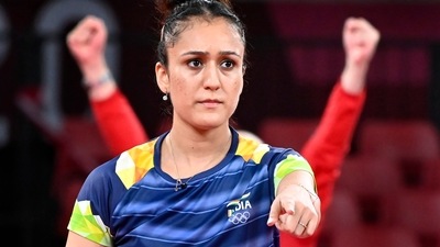 Tokyo Olympics: India's Manika Batra in action during her Summer Olympics 2020 table tennis round 3 match against Austria's Sofia Polcanova, in Tokyo, Monday, July 26, 2021. Batra lost 0-4. (PTI) Tokyo Olympics: India's Manika Batra in action during her Summer Olympics 2020 table tennis round 3 match against Austria's Sofia Polcanova, in Tokyo, Monday, July 26, 2021. Batra lost 0-4. (PTI)