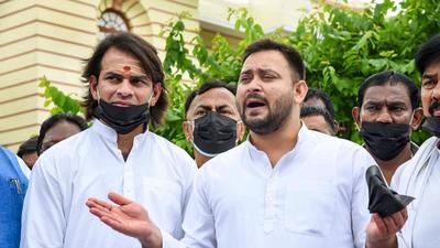 RJD leader Tejashwi Yadav addresses media outside Bihar legislative assembly during the first day of the monsoon session, in Patna on Monday July 26. (PTI) RJD leader Tejashwi Yadav addresses media outside Bihar legislative assembly during the first day of the monsoon session, in Patna on Monday July 26. (PTI)