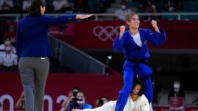 Nora Gjakova of Kosovo reacts as she competes with Tsukasa Yoshida of Japan in their women's -57kg semifinal judo match, at the 2020 Summer Olympics in Tokyo, Japan, Monday, July 26, 2021. (AP Photo/Vincent Thian) (AP) Nora Gjakova of Kosovo reacts as she competes with Tsukasa Yoshida of Japan in their women's -57kg semifinal judo match, at the 2020 Summer Olympics in Tokyo, Japan, Monday, July 26, 2021. (AP Photo/Vincent Thian) (AP)