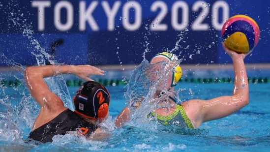 Tokyo 2020 Olympics - Water Polo - Women - Group A - Australia v Netherlands- Tatsumi Water Polo Centre, Tokyo, Japan - July 26, 2021. Abby Andrews of Australia in action against Maud Megens of Netherlands. REUTERS/Kacper Pempel(REUTERS)