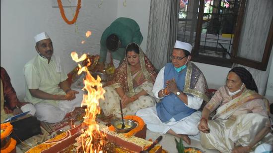 Uttarakhand chief minister Pushkar Singh Dhami moved into the CM house in Dehradun amid chants and drumbeats, with auspicious traditional Garhwali songs being sung in the background.
