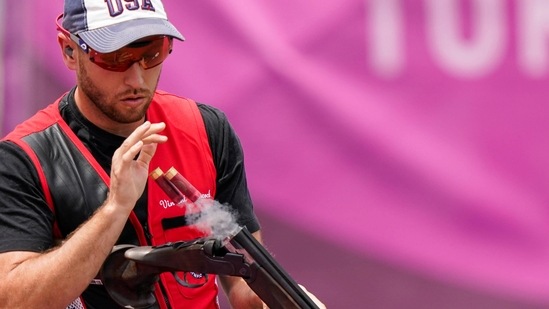 Vincent Hancock, of the United States, ejects his shells as he competes in the men's skeet at the Asaka Shooting Range in the 2020 Summer Olympics, Monday, July 26, 2021, in Tokyo, Japan. (AP Photo/Alex Brandon)(AP)