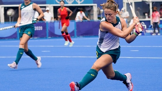 Australia's Ambrosia Malone scores on China goalkeeper Dongxiao Li during a women's field hockey match at the 2020 Summer Olympics, Monday, July 26, 2021, in Tokyo, Japan. (AP Photo/John Minchillo)(AP)