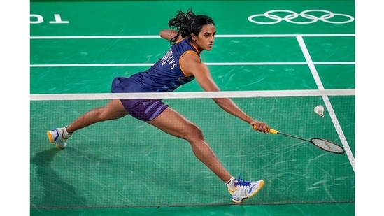 India's Pusarla V Sindhu competes against Israel’s Ksenia Polikarpova during their women's singles badminton match, in Tokyo on July 25. Sindhu beat Polikarpova with scores of 27-7, 21-10.