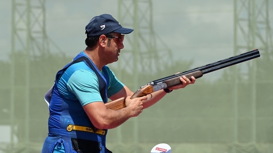 India's Mairaj Ahmad Khan competes in the men�s 10m air rifle qualification during the Tokyo 2020 Olympic Games at the Asaka Shooting Range in the Nerima district of Tokyo on July 25, 2021. (Photo by Tauseef MUSTAFA / AFP)(AFP)