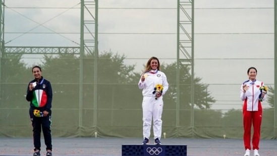 Silver medalist Diana Bacosi, of Italy, gold medalist Amber English, of the United States, and bronze medalist Wei Meng, of China, celebrate after the women's skeet at the Asaka Shooting Range in the 2020 Summer Olympics, Monday, July 26, 2021, in Tokyo, Japan. (AP Photo/Alex Brandon)(AP)