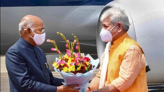 President Ram Nath Kovind being received by J&K L-G Manoj Sinha on his arrival in Srinagar on Sunday, July 25. (PTI)