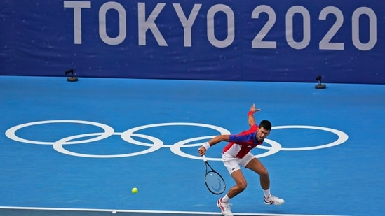 Novak Djokovick, of Serbia, plays Jan-Lennard Struff, of Germany, during the second round of the tennis competition at the 2020 Summer Olympics, Monday, July 26, 2021, in Tokyo, Japan. (AP Photo/Seth Wenig)(AP)
