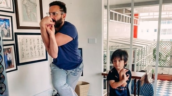 Saif Ali Khan and Taimur during a yoga session.