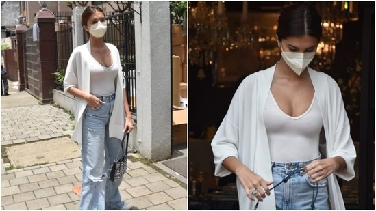 Tara complemented her ensemble with a black and white top-handle bag, chunky white sneakers and a no-makeup look.(Varinder Chawla)