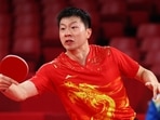 Ma Long of China in action against Sharath Kamal Achanta of India at Tokyo Olympics 2020